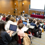 Audience observing panel on probiotics for preterm infants